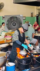 The famous Michelin star chef Jay Fai cooking up a crab omelette at her restaurant in Bangkok 😋🫕🦞 📍 https://maps.app.goo.gl/AapAnawm8ouz1xUE6 | Mike Abroad