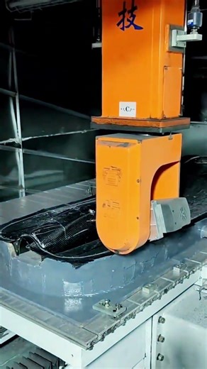 A five-axis CNC machine for cutting non-metallic materials like composites, plastics, and foam.