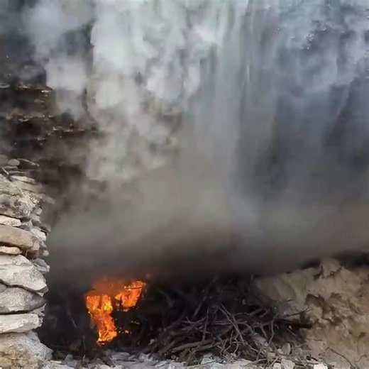 I Built a Warm Rock Shelter with Fire During a Snowstorm 🥶🔥 #shorts