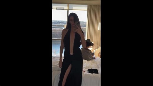 Aussie model stuns in plunging black gown