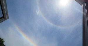 Rare circumhorizontal arc forms upside-down rainbows below the sun
