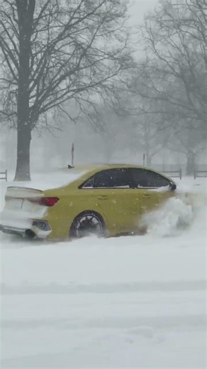 yellow RS3 doing donuts in the snow.#Audi #snowstorm #car #mockingbird