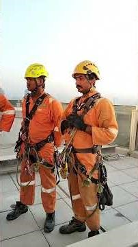 Getting ready for work,wearing safety harnesses before get on Ropes,first we attend Safety briefing.