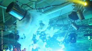 Foam generator hangs from the ceiling in a nightclub