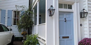 Here’s why front porches have doors on some Charleston homes