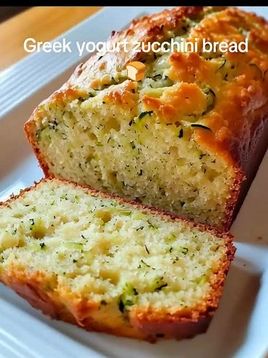 Greek Yogurt Zucchini Bread - moist, healthy, and absolutely delightful!🍞 Greek Yogurt Zucchini Bread🍞 Ingredients: - 1 1/2 cups grated zucchini (about 2 medium) - 2 large eggs - 1/2 cup plain Greek yogurt - 1/3 cup honey or maple syrup - 1/4 cup vegetable oil or melted coconut oil - 1 teaspoon vanilla extract - 1 1/2 cups whole wheat flour (or all-purpose flour) - 1 teaspoon baking powder - 1/2 teaspoon baking soda - 1/2 teaspoon ground cinnamon - 1/4 teaspoon ground nutmeg - 1/4 teaspoon sal