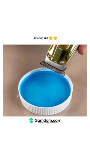 universe_decode on Instagram: "The post features a 15-second video tutorial on cleaning an Enice electric hair trimmer by removing the blade and pressing it into a blue disinfectant gel, which dissolves hair residue and sanitises in seconds. Shared on 13 January 2026, it has amassed 2.7 million views and 330 replies, mostly from Indonesian users noting the ease of maintaining clipper hygiene to avoid clogs. Such gels mimic EPA-registered clipper cleaners like Andis Cool Care, which peer-reviewed