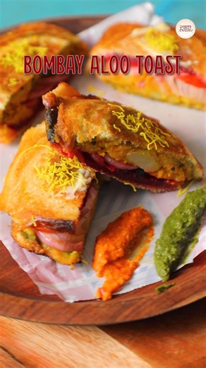 Morning breakfast mein banaiye Bombay Aloo Toast Sandwich. Recipe by Chef Kapil Verma ingredients: Oil - 1 tsp Mustard Seeds - ½ tsp Asafoetida - ¼ tsp Ginger Garlic Paste - 1 tsp Curry Leaves - 10- 15 min Potatoes 5 (boiled & mashed) Salt (as per taste) Red Chilli Powder - ½ tsp Turmeric Powder - ½ tsp Coriander Seed Powder - 1 tsp Garam Masala - 1 tsp Water (as required) Coriander Leaves (chopped) Bread Slices - 4 Butter Coriander & Mint Chutney Tomato (sliced) Beetroot - 1 (boiled & sliced) S