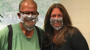 Woman crafts clear ‘window’ face mask to safely communicate with deaf co-worker
