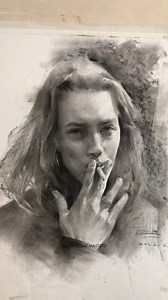 Contemplative Intimacy: The Art of Quiet Gesture In this atmospheric charcoal portrait by Lao Bai (Douyin), we encounter drawing that captures private moments with sensitive observation. The artist demonstrates understanding of how charcoal's inherent softness can suggest both physical form and emotional mood, creating a work that feels genuinely intimate rather than posed. The loose, gestural background contrasts with more focused attention on facial features and hand positioning. The artist sh