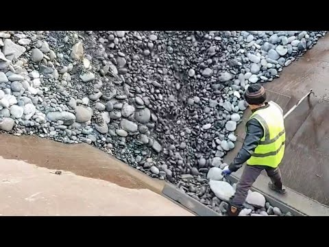 Barges unloading 2500 tons of cobblestone - Work vlog on a barge