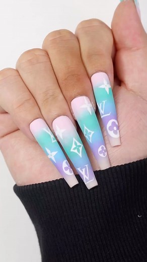 40 reactions · 4 comments | Looking for the designer nails of your dreams? Look no further! Here’s how we do a Louis Vuitton inspired nail art design with a dreamy cotton candy ombre! ️ Colors used: Wanderlust 210 It’s Giving Bougie 175 7 Magic Mountains 98 All You Kneed is Love 230 #PLANails  #PLApro #parislashacademy #designernails #louisvuittonnails | PLA Nails | Facebook
