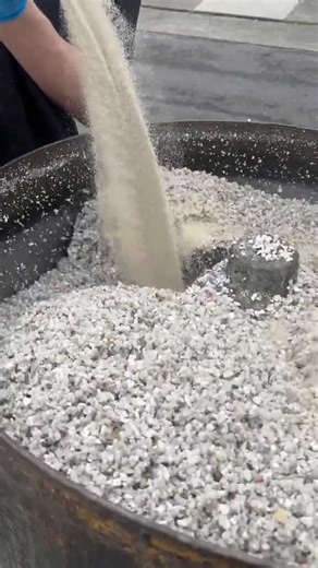 Watch how a resin bound surface is made step by step