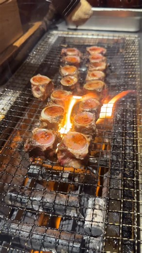 Rain hits the glass. The robata fire answers. 🔥🌧️ Sunday, October 12 — a gray, rainy 50°F outside. But inside Roppongi, the heat rises from the binchōtan grill, flames kissing cuts of A5 Wagyu, tiger prawn, and king crab. The scent alone could melt the cold right off your skin. This is robata-yaki — Japan’s fire cuisine. Slow, deliberate, primal. Every skewer grilled to perfection by hand, the way it’s done in the hidden corners of Roppongi, Tokyo. Pair it with your omakase — from buttery Hokk