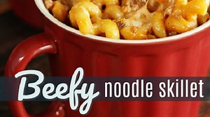This 15 Minute Beef and Noodles Skillet recipe is perfect for those busy nights when you need dinner quick. Ground beef and noodles with a creamy, cheesy sauce. https://www.favfamilyrecipes.com/15-minute-beefy-noodle-skillet/ | Favorite Family Recipes