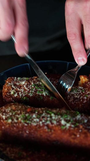 Our deep fried lasagna, panko crusted, perfectly golden, and served on a bed of our signature tomato sauce. Crispy on the outside, soft and rich on the inside, packed with flavor in every bite. It’s everything you could ask for… all in one plate. Come give it a try!