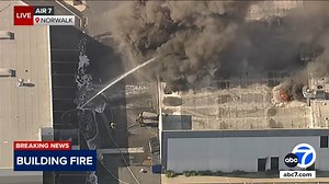 Fire rips through warehouse building in Norwalk