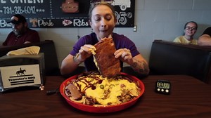 Woman attempts BBQ nachos food challenge that has a 94% fail rate!