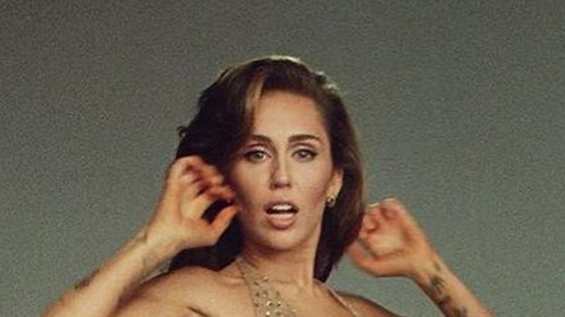 Miley Cyrus flaunts her long legs in see-through dress as she promotes single