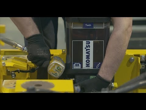 Komatsu & Groeneveld automatic greasing system for excavators