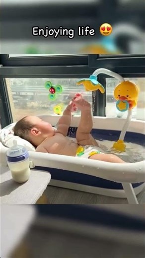 Learning Through Play: A Baby’s Joy in the Bathtub
