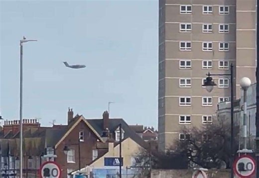 Footage shows huge RAF aircraft flying low over town