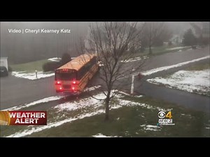 School Bus Slides Down Icy Hill, Crashes Into Car