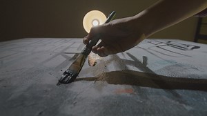 Artist painting painting on a canvas - Free Stock Video