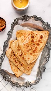Indian Cooking 101 🇮🇳 Growing up in India, roti and parathas were part of our everyday meals. When I moved to the US, I had to learn how to make them myself. After years of practice, making hot parathas has become second nature, and I’m excited to share my tips with you. Comment ‘Parathas’ and I’ll DM you the full recipe ❤️ #paratha #indiancuisine #desifood #cooking101 | Ministry of Curry