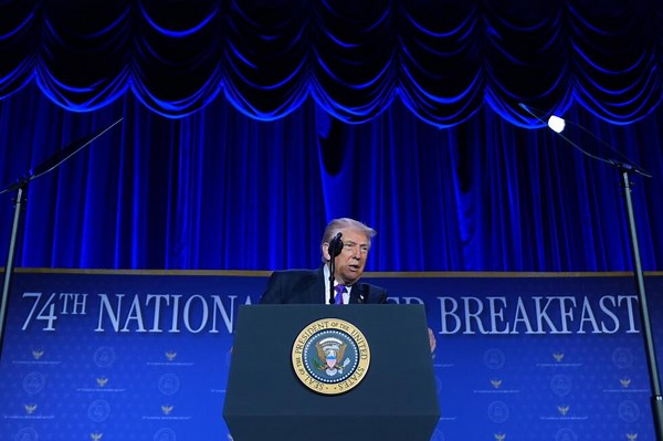 Trump takes on critics with a litany of insults at National Prayer Breakfast