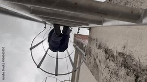 Technical engineer Inspecting the installation of the solar panels and checking the integrity of all wires connected to the solar panels. for the system to work properly