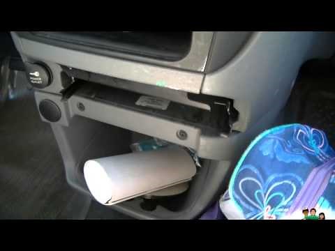 How to remove the Cup Holder Tray for a Dodge Caravan