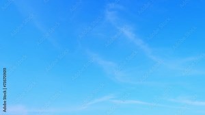 4K : Blue sky time-lapse - Nature's masterpiece unfolds as the azure sky blends with dynamic cloud formations in this timelapse. Tranquil skies and Unclouded view concept. Summer sky background.