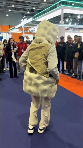Demonstration of elderly anti-fall safety vest at expo in Guangzhou, China