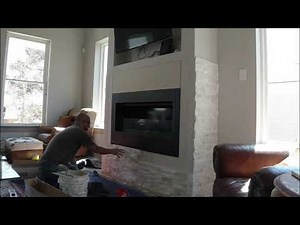 Stacked stone fireplace install