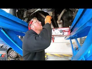 Triumph TR7 V8 exhaust and chassis inspection