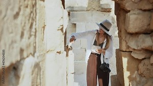 Archaeological Digging Site: Great Female Archeologist Work on Excavation Site, Cleaning Cultural Artifacts with Brush and Tools. Discovery of Ancient Civilization Temple, Architecture, Fossil Remains