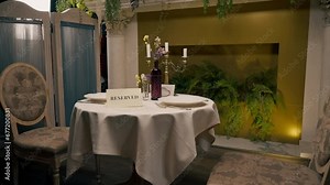 a reservation sign reserved standing on a table in an expensive luxury Italian restaurant