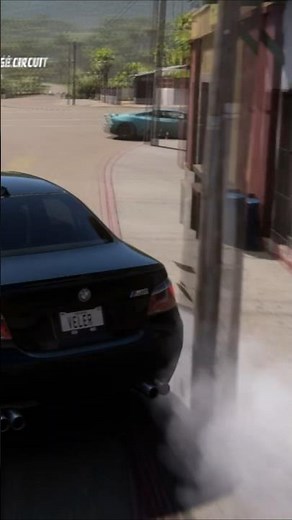 BMW E60 M5 drift in a narrow street