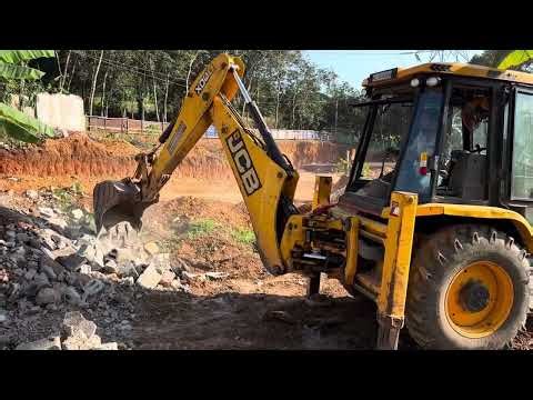 Jcb 3dx demolishing old buildings