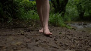 Woman Barefoot Walks On Muddy Ground Stock Footage Video (100% Royalty-free) 3642574757 | Shutterstock