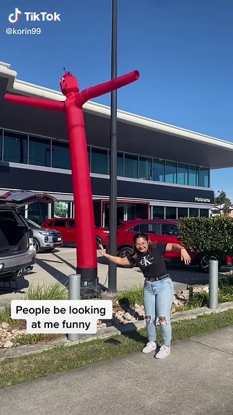 Hilarious Inflatable Man Prank at Car Dealership