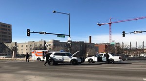 Denver officers execute P.I.T. maneuver to stop carjacking suspect at busy intersection