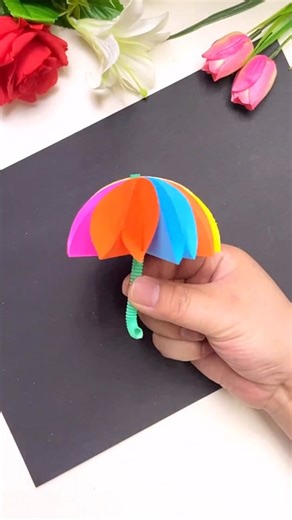 Colorful umbrella | follow for more videos #creativeideas #diycraft #handcrafted #papercraftideas #papercraftsforkids #papercraftartist #papercraft