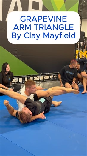 @judo.law on Instagram: "GRAPEVINE LEG TRIANGLE Clay Mayfield’s crisp, mat-ready breakdown of an arm-triangle (kata gatame) from mount with a grapevine leg assist—the leg entanglement that tilts their hips and tightens the choke angle. Setup from mount Pin the near arm across. From mount, cross-face under their head with your head-side arm and use your other hand to shove their near elbow across their centerline. Walk your hand to the mat beside their ear; their shoulder should start covering th