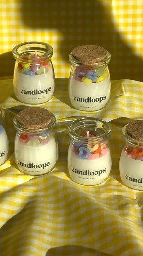 Made fruit loop candles for our school fair and now the whole house smells like breakfast 🥣 THEY SMELL JUST LIKE FRUIT LOOPS. #schoolfair #fruitloops #cerealcandle #candles #howtomakecandles | NAMA BITES