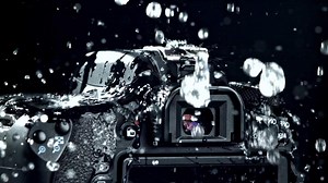 Super slow motion drops of water fall on camera, lens. High quality FullHD footage