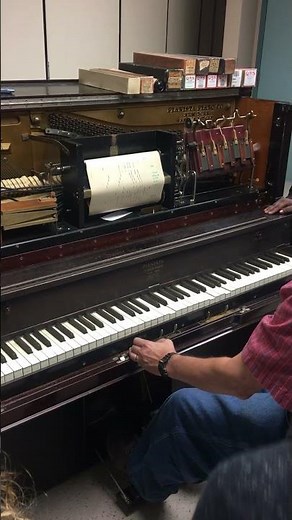 Player Piano (Pianola) -Museum attendant demonstrates the Pianola.