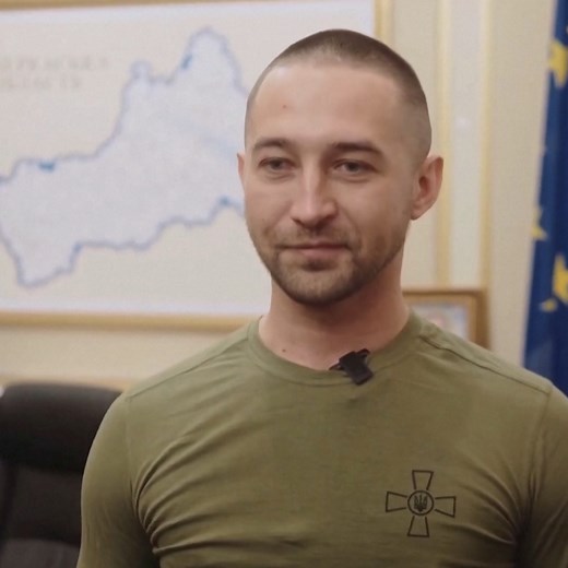 A soldier who defied the invading Russian navy at Ukraine's Snake Island was believed to be dead. He has since returned in a prisoner swap with Russia and is now being honored for his bravery. | DW News