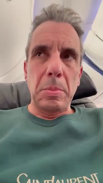 When a dog’s whimpers take center stage on a flight... Brace yourselves for the ‘Dogs vs. Humans’ showdown! Let the fur-flying debate commence! #ItAintRight | Sebastian Maniscalco